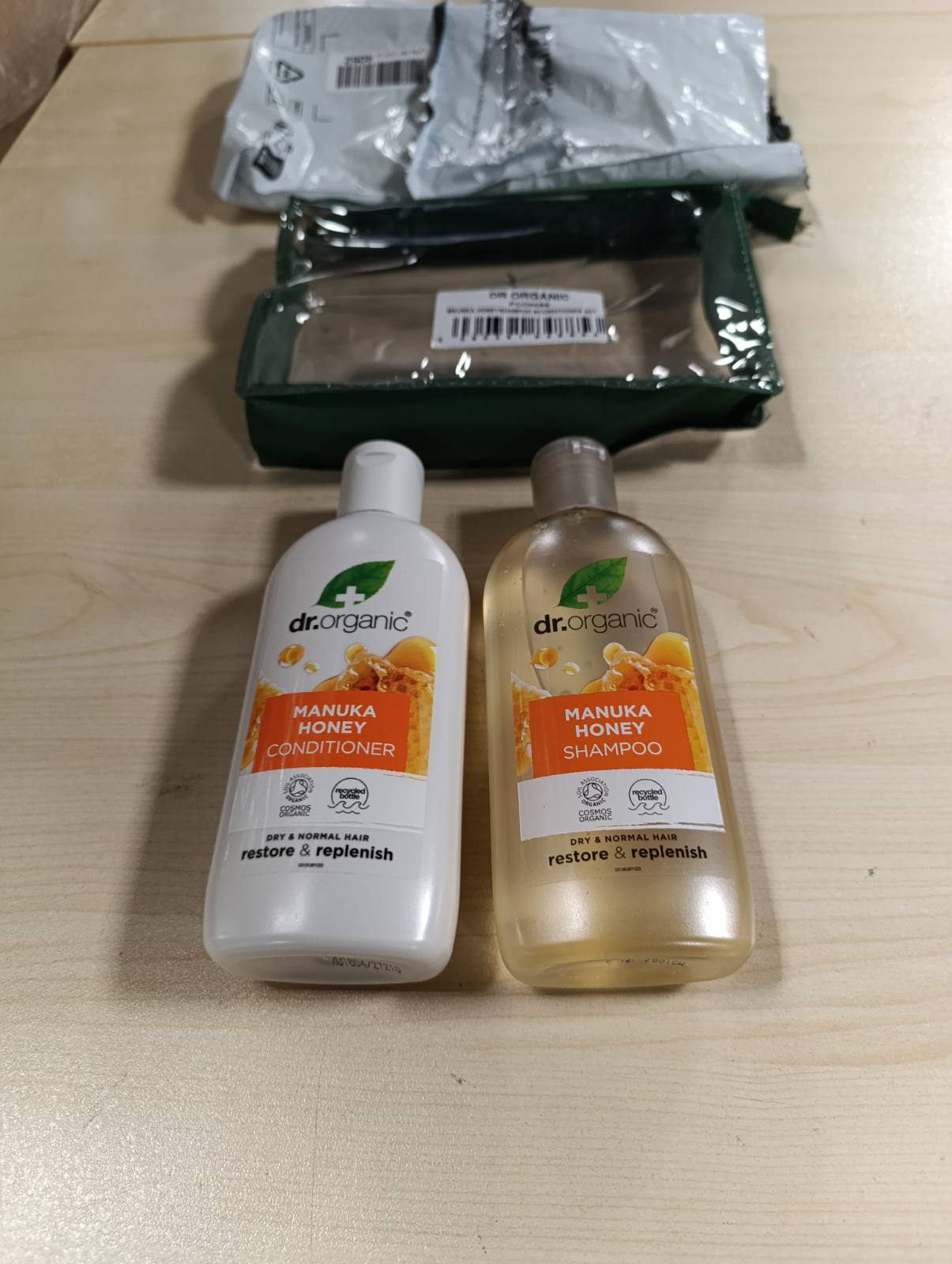 272218 - Set shampo dhe balsami Dr Organic Manuka me mjaltë, 265ml x2, me çantë udhëtimi
