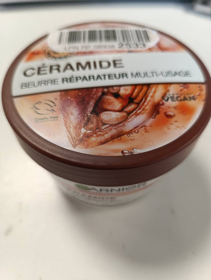 297656 - GARNIER - Superushqim për Trupin - Krem Riparues - Hidratim 48 orësh - Formulë vegane - 97% origjinë natyrale - Me gjalpë kakaoje dhe ceramide - 380 ml