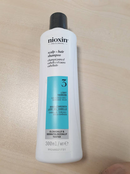 290006 - NIOXIN Shampo për skalpin dhe flokët System 3, forcuese për flokë të dëmtuar me hollim të lehtë, me Biotinë dhe Niacinamidë, 300ml