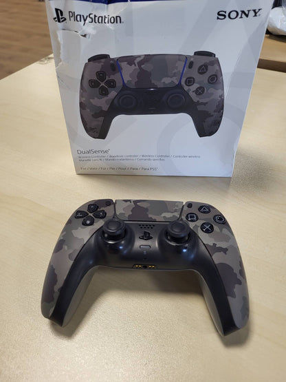 292273 - PLAYSTATION Kontrollues pa tel DualSense® - Gri kamuflazh