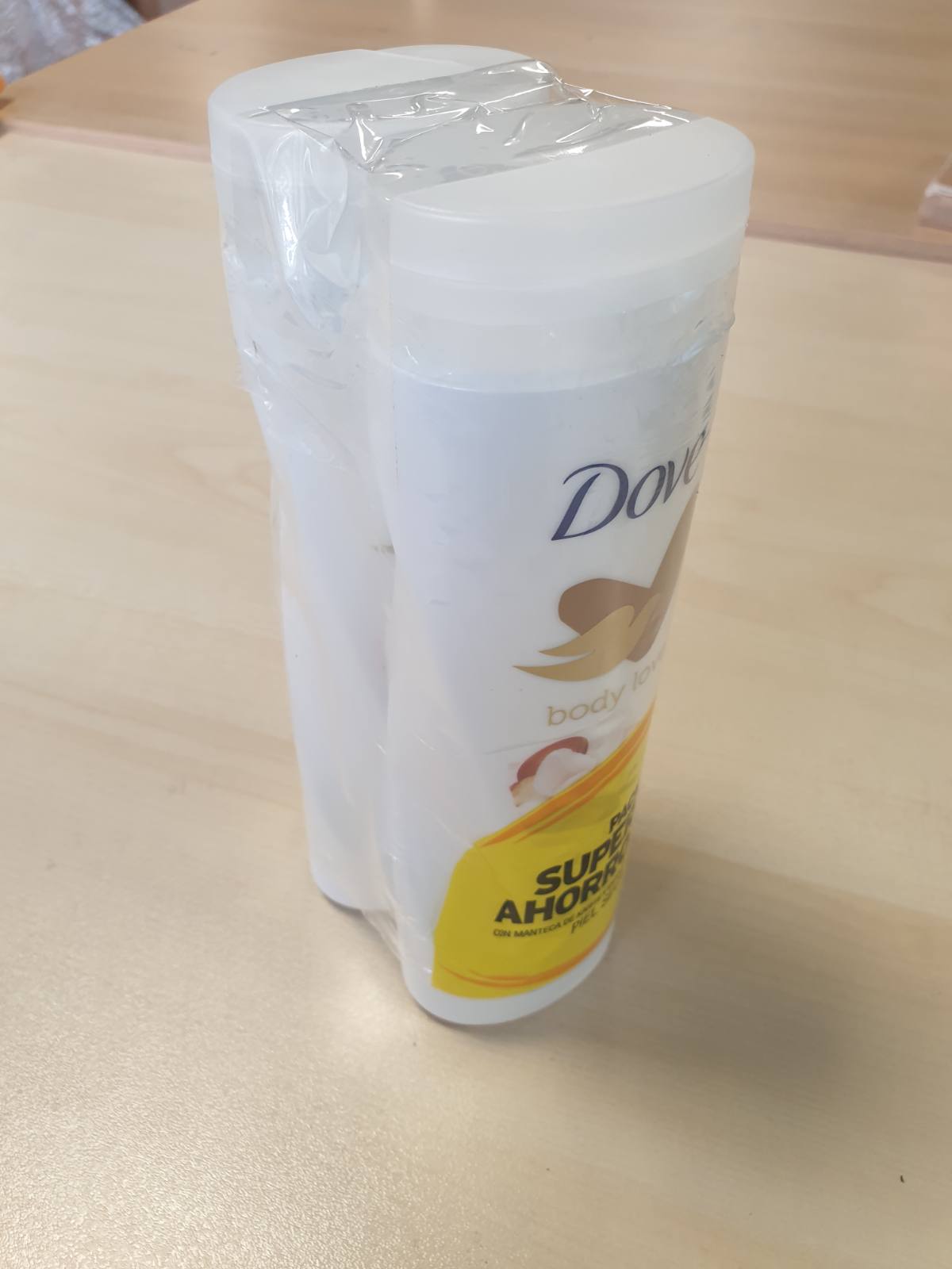 303758 - DOVE Krem Hidratues Trupi Value Pack me Gjalpë Shea dhe Vanilje, 2 x 400ml