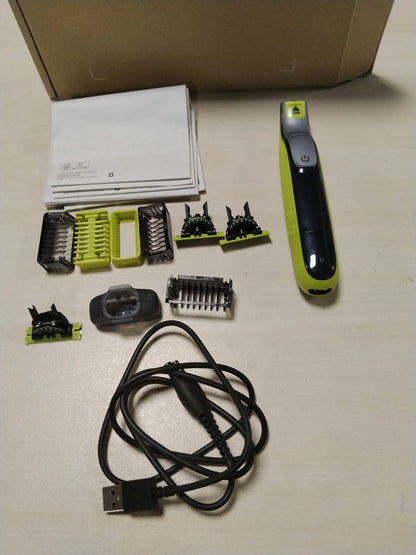 307205 - PHILIPS OneBlade 360 Face & Body, makinë rroje elektrike, 3 tehe 360, 4 aksesorë prerëse (1/2/3/5 mm), 2 aksesorë trupi, rroje e lagësht dhe e thatë (QP2834/31)