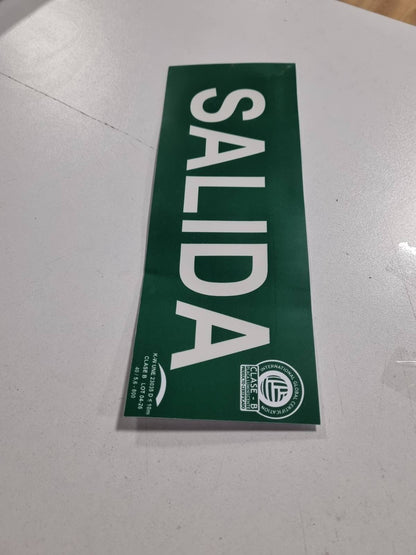 309399 - IBERNORMA SPB004 Prizë Evakuimi Sinjali 30x10.5cm Klasa BD≤7m Lumineshente PVC e Miratuar UNE 23034:2023 (Klasa B)