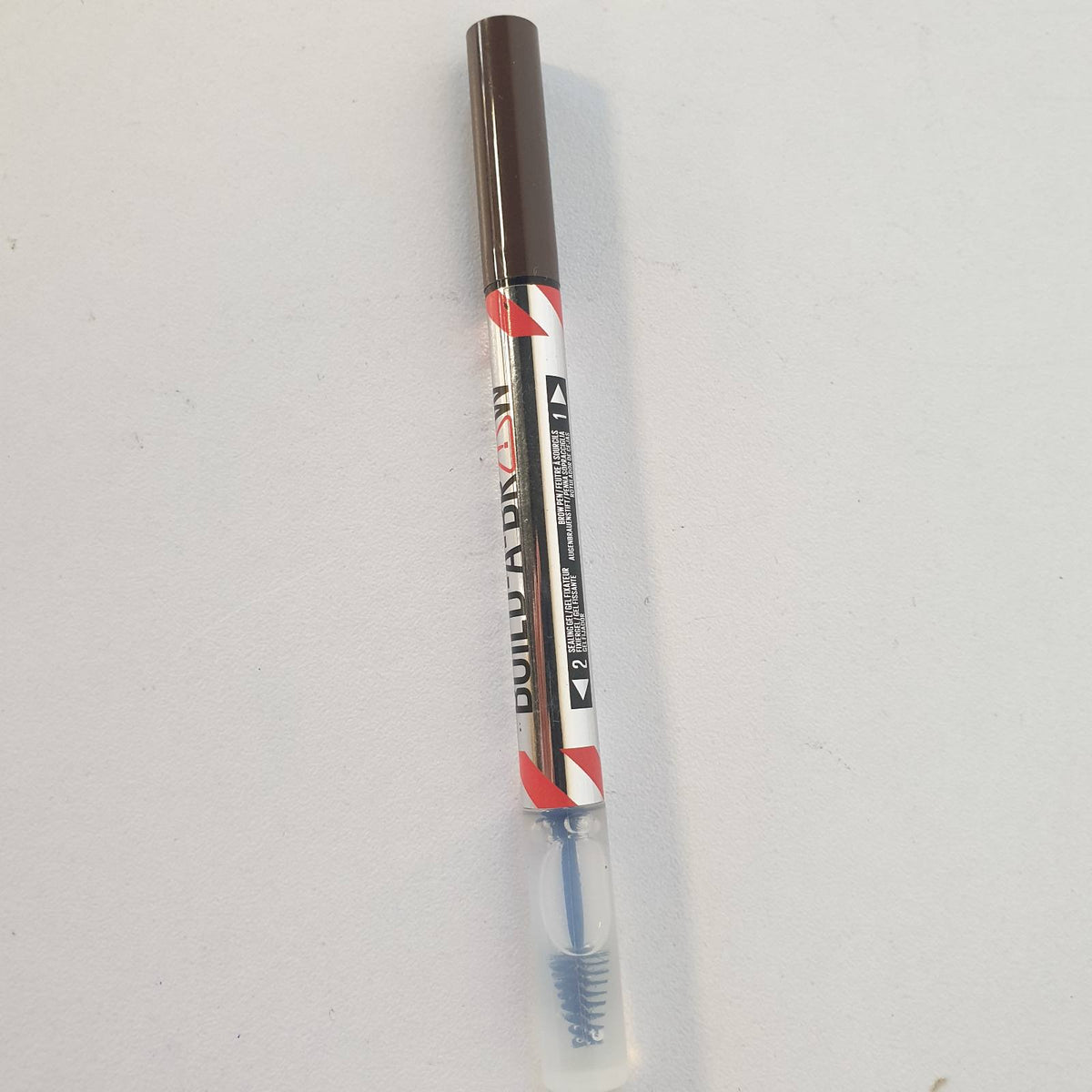 311958 - MAYBELLINE NEW YORK Stilolaps dhe xhel për vetulla 2 në 1, Ngjyra: Kafe e thellë, Qëndron deri në 24 orë, Rezistente ndaj ujit, Formulë vegane