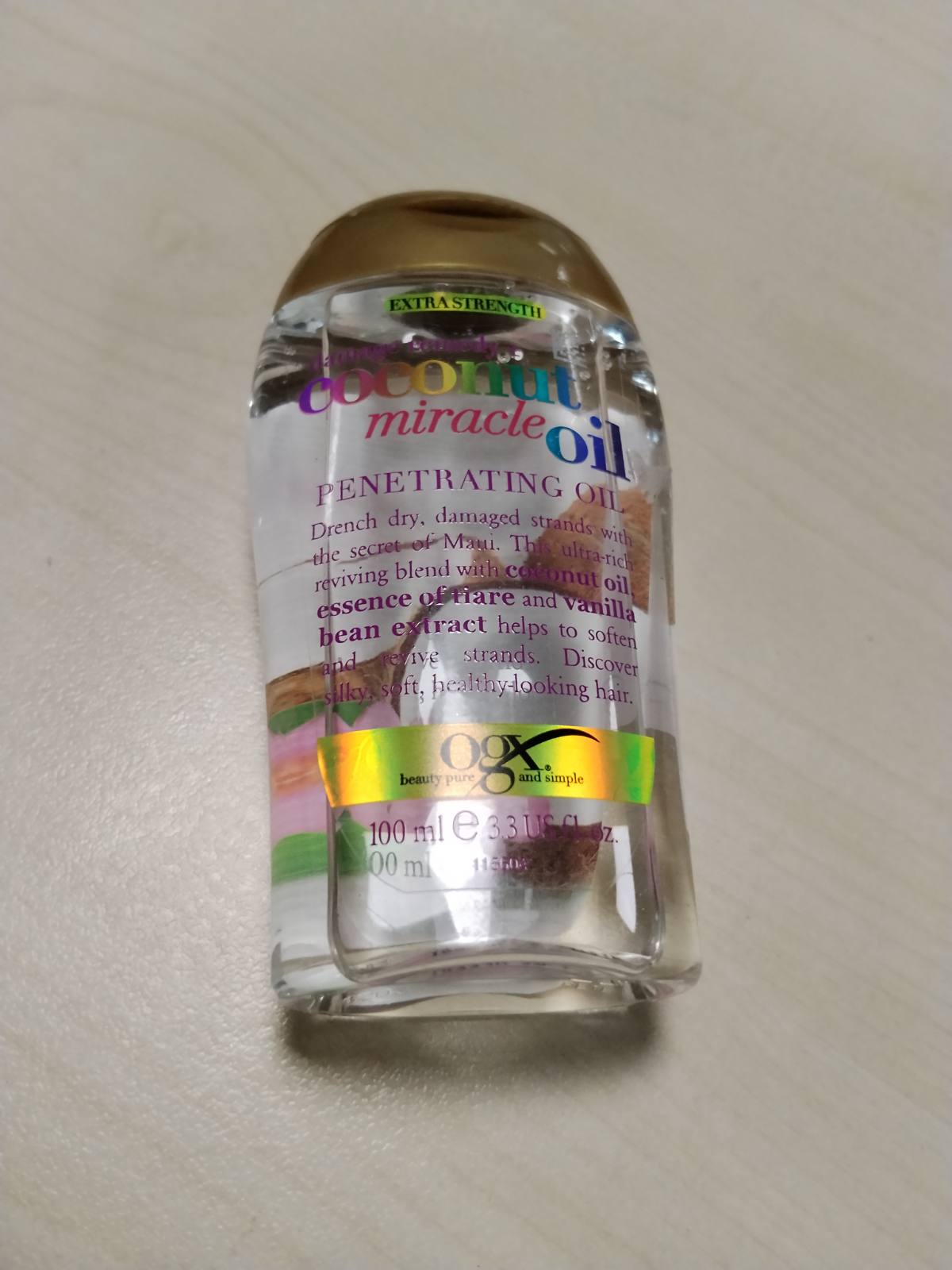 312332 - OGX Dëmtim Remedy + Vaj Mrekullie Kokosi, 100 ml, vaj riparues për flokët
