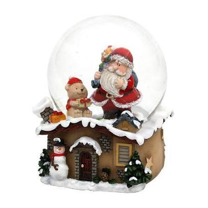 187991 - Dekohelden24 501473 – Decorative snow globe with Santa Claus and teddy bear. Dimensions 7 × 7 × 9 cm, with ball 6.5 cm. Beautiful decoration for the festive Christmas atmosphere.
