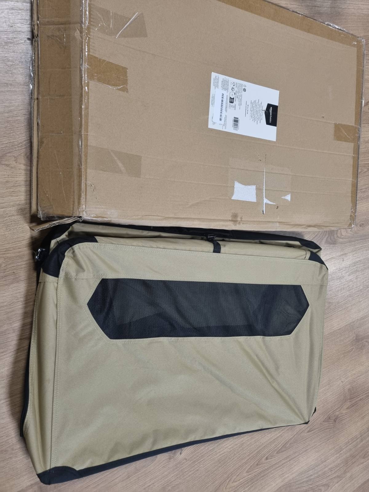231448 - Amazon Basics Kafaz portativ udhëtimi për qen me 2 dyer, i palosshëm dhe me material të butë, madhësia M (76 × 53 × 53 cm), ngjyrë kafe.