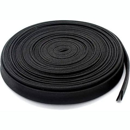 206889 -Shirit për qepje bias (bias binding) – 30 mm gjerësi, i palosur 15 mm, rrotull 25 m, 50% pambuk dhe 50% poliester, i përdorur për skaje në qepje, dekorime, tapiceri, mobilje, veshje dhe batanije.