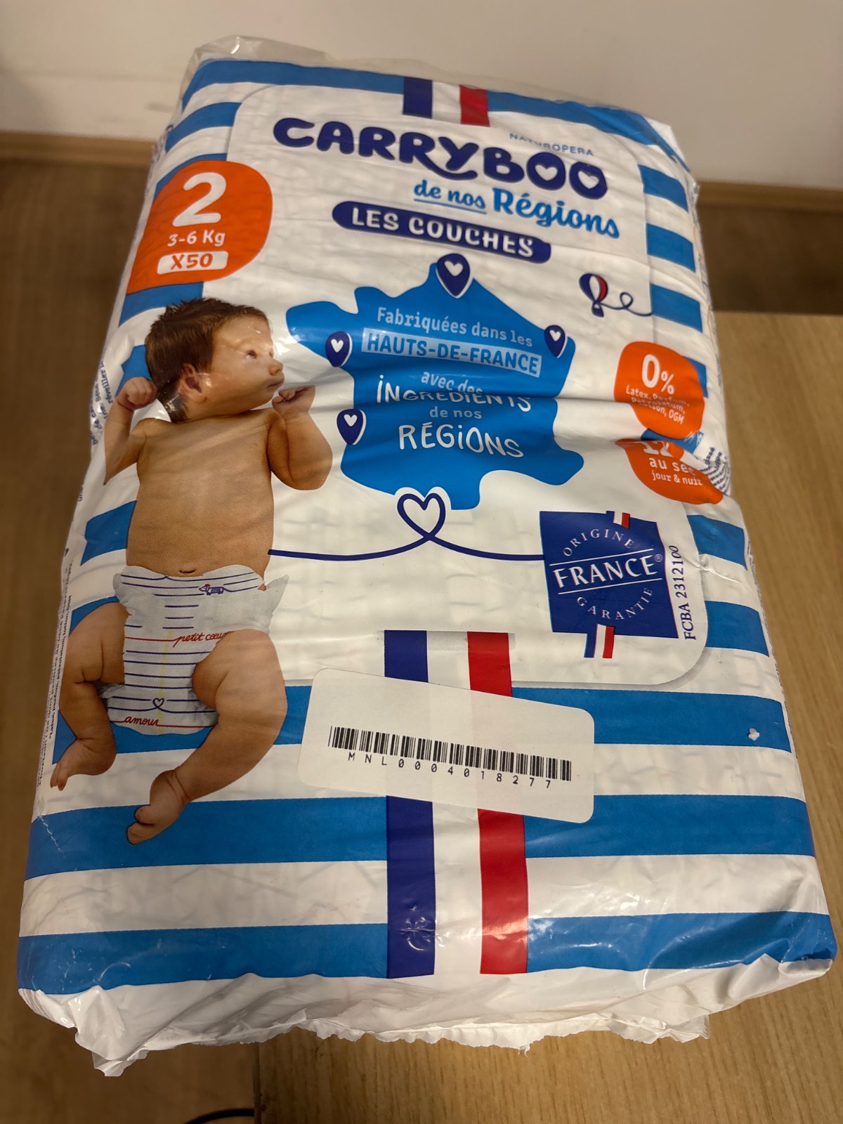 311381 - Carryboo – Pelena për bebe, madhësia 2 (3–6 kg), 50 copë.