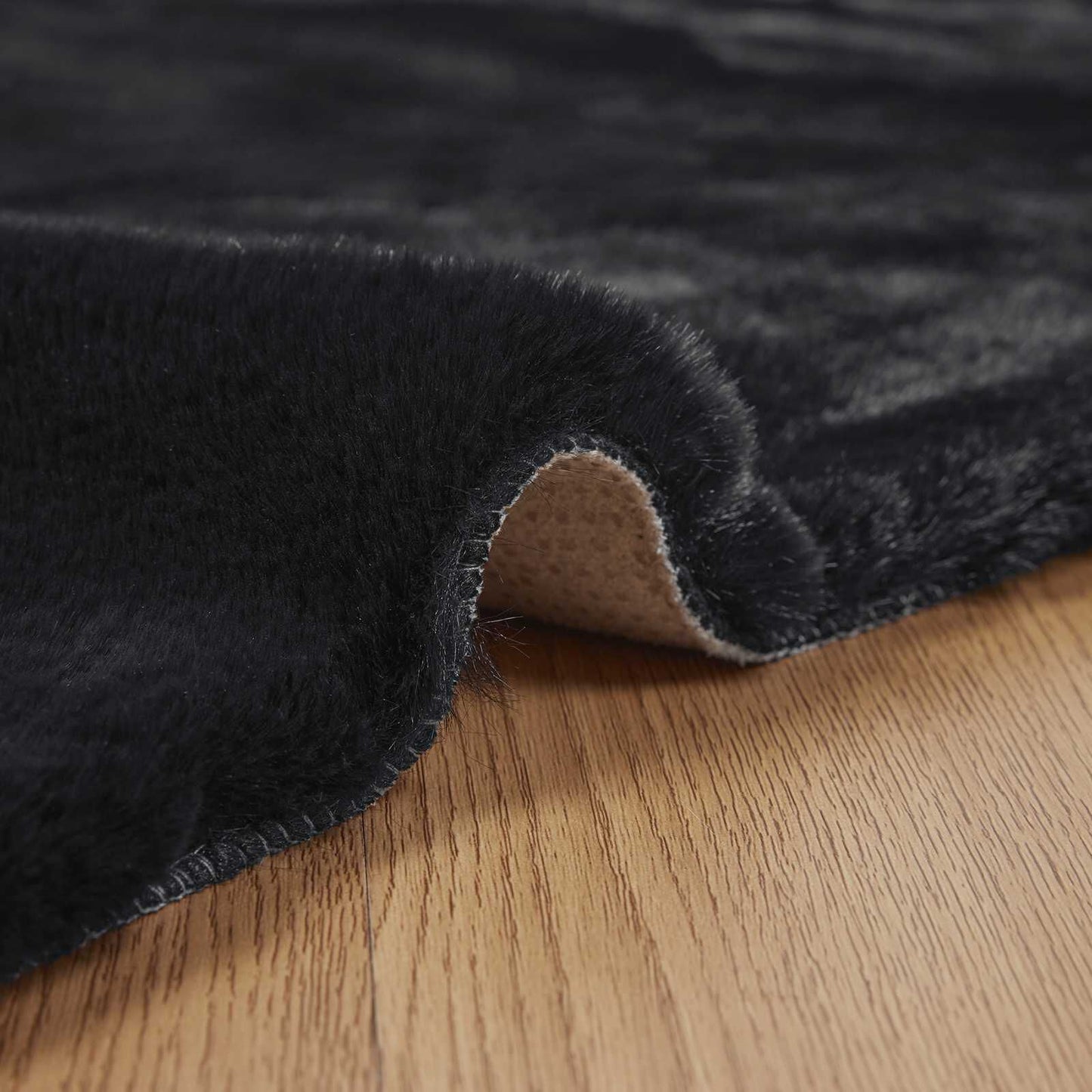 280450 - vidaXL Qilim Anti-Rrëshqitës me Lesh Lepuri Artificial OLITE i Zi 80 x 150 cm Poliester