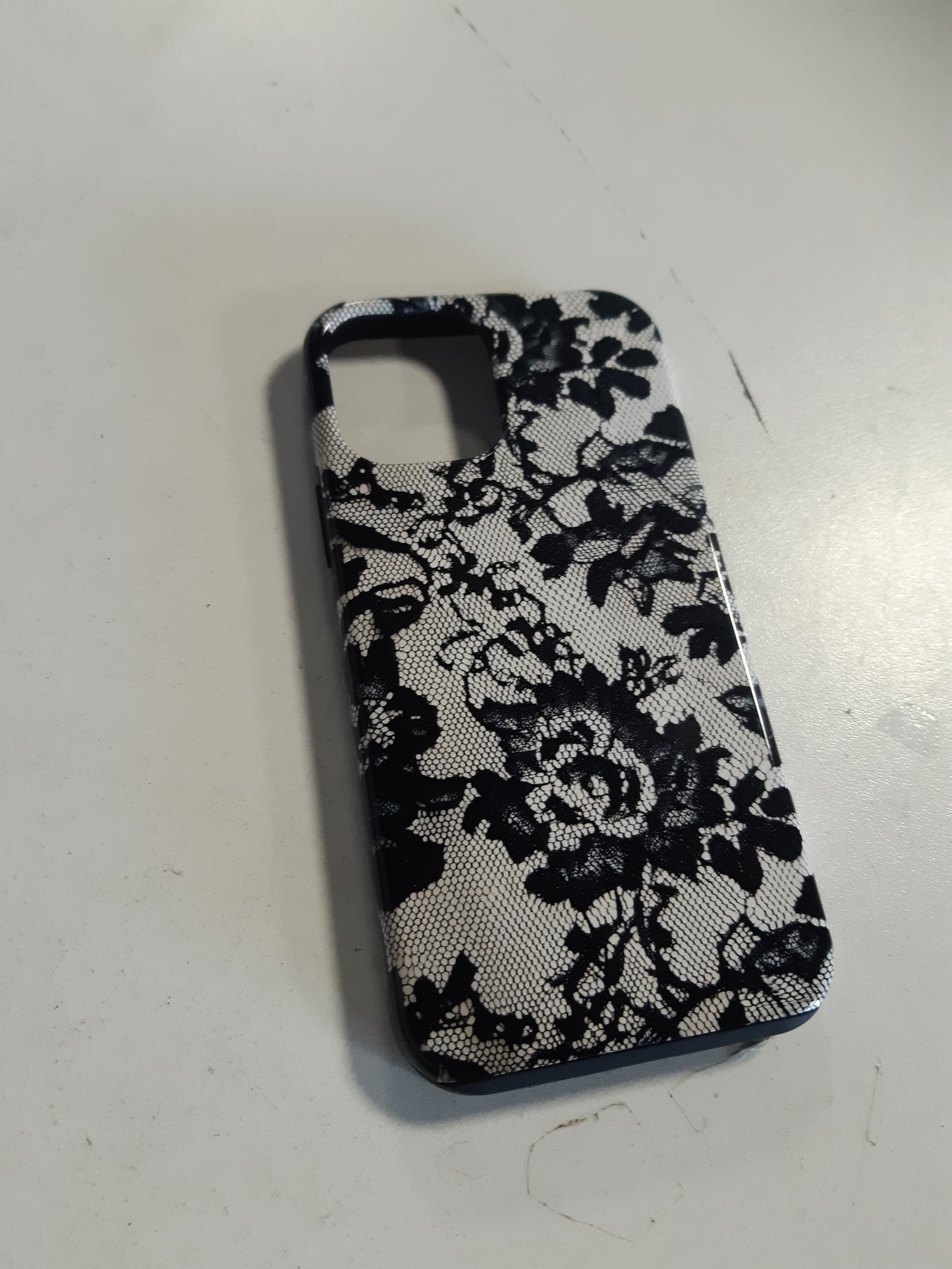 266781 - MBËSHTJELLËSE ME MODEL DANTELLE TË ZEZË PËR IPHONE 12/12 PRO