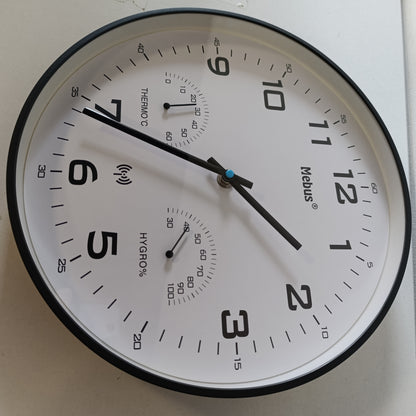 184234 - MEBUS Orë Moderne Muri me Radio-Kontroll, Ekran Temperature dhe Lagështie, 30cm, Modeli: 52840, Ngjyra: E Zezë