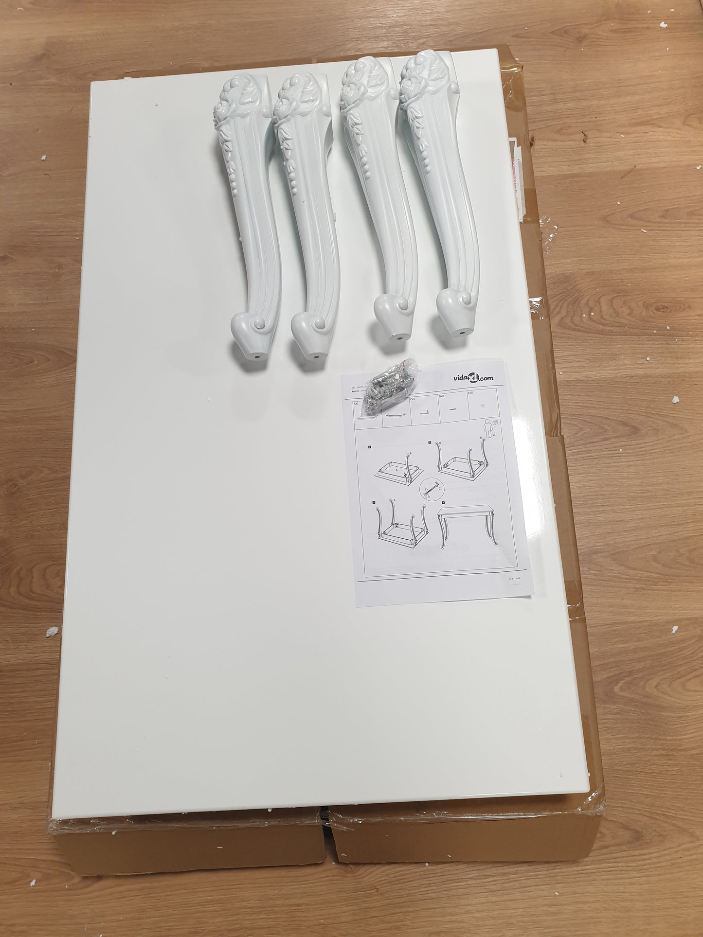 244379 - VIDAXL Tavolinë kafeje 100x60x42 cm E bardhë me shkëlqim të lartë