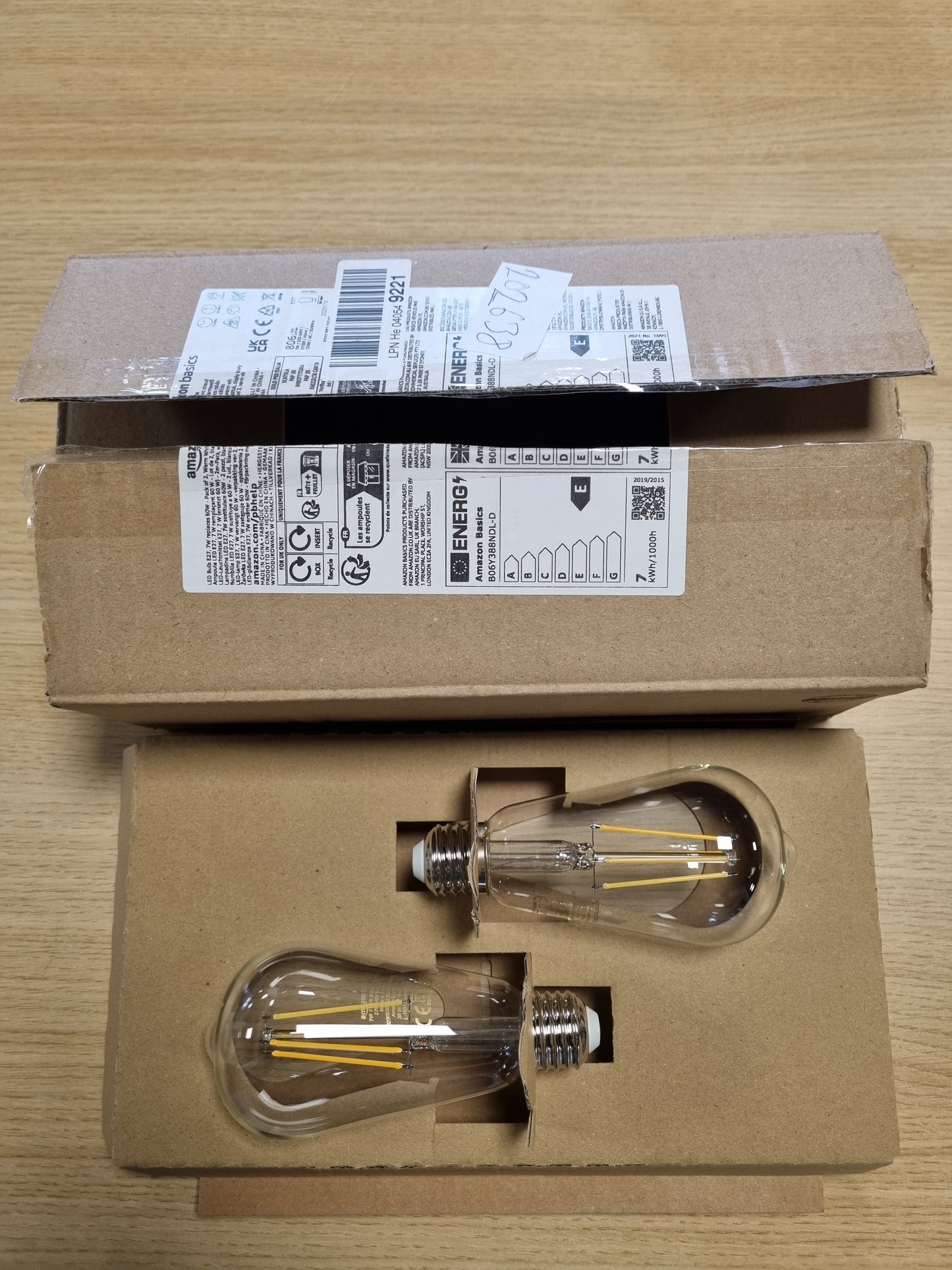 202638 - AMAZON BASICS Pako me 2 Llamba LED Vintage Edison, Bazë E27 ST64, 7W (Ekuivalent i 60W), Filament i Transparent, pa Capacitet për Të Errësuar