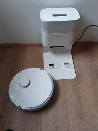 144021 - DREAME L10s Plus - Fshesë Robotike me Korrent dhe Pastrues Dyshemeje me Zbrazje Automatike, Kapacitet Pluhuri 90 Dite, Fuqi Thithjeje 7000 Pa, Pastrim DuoScrub™, Ngritje Automatike e Mopit