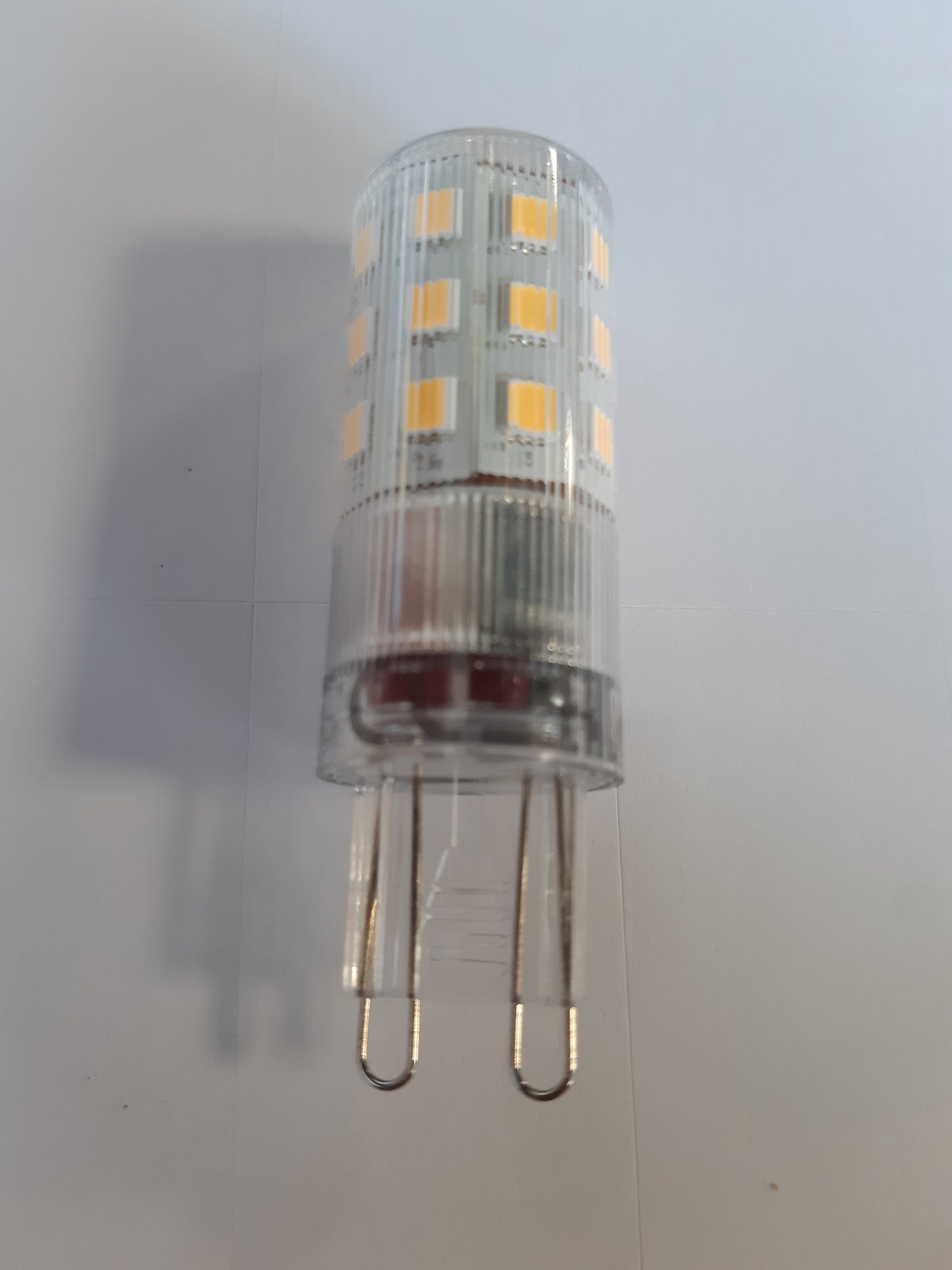 224352 - OSRAM Llambë LED shumëngjyrëshe G9, 4.9 W / 806 lm, e qartë, dritë e bardhë e ngrohtë 2700 K, pa errësim, IP20, xham pa plumb, diametër 18 mm