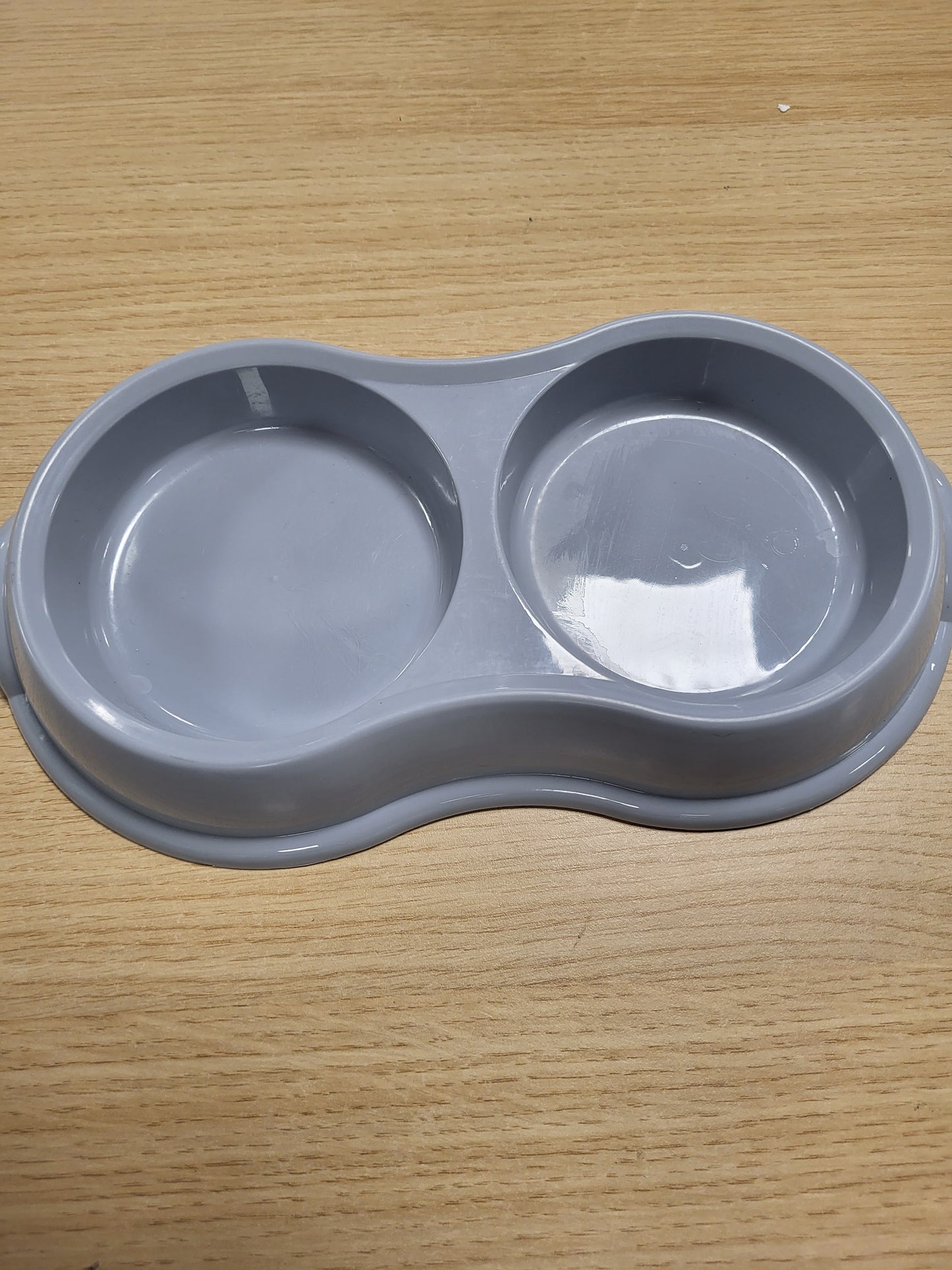 216908 - TRIXIE Tas i dyfishtë, plastik, 2 x 0.2 l, Ø 11 cm, 26 x 4 x 14 cm