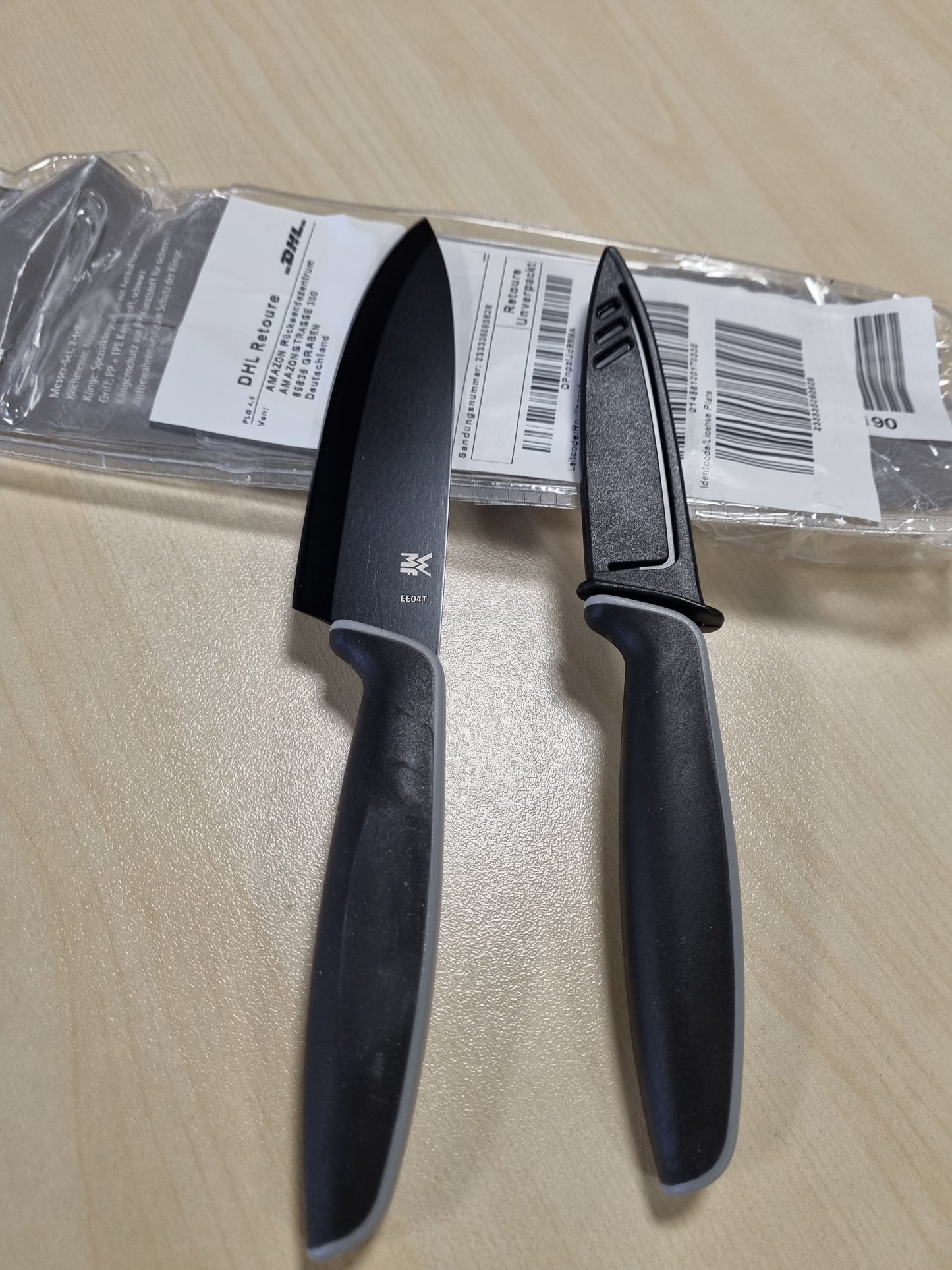 201488 - WMF TOUCH ME - Set 2 thikash kuzhine me mbështjellës mbrojtës, çelik special me shtresë jo-ngjitëse, e zezë.