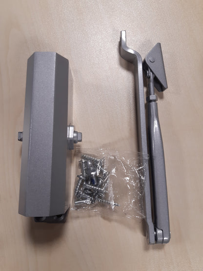 164582 - BRICARD - Mbyllësi i dyerve me krah gërshërë 6100107, forcë 2-4 (deri në 80 kg), Teknologji Rafti dhe Pinioni, Ngjyrë Argjendi