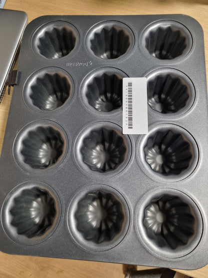 215321 - Wilton Gold – Tavë pjekjeje prej çeliku inox me shtresë kundër ngjitjes, me 12 zgavra për mini kekë me formë të valëzuar, pa PFAS, paketimi mund të ndryshojë