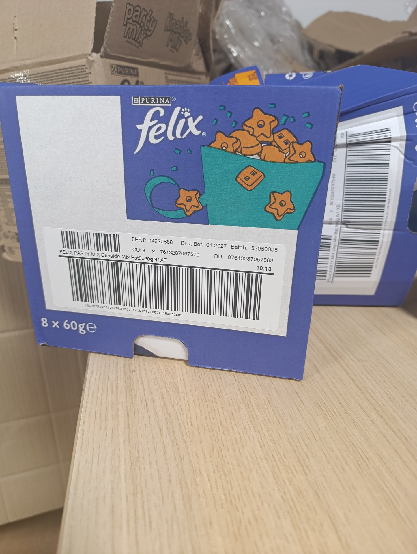 141812 - Felix Purina Party Mix me shije oqeani për macet, 8 x 60 g.