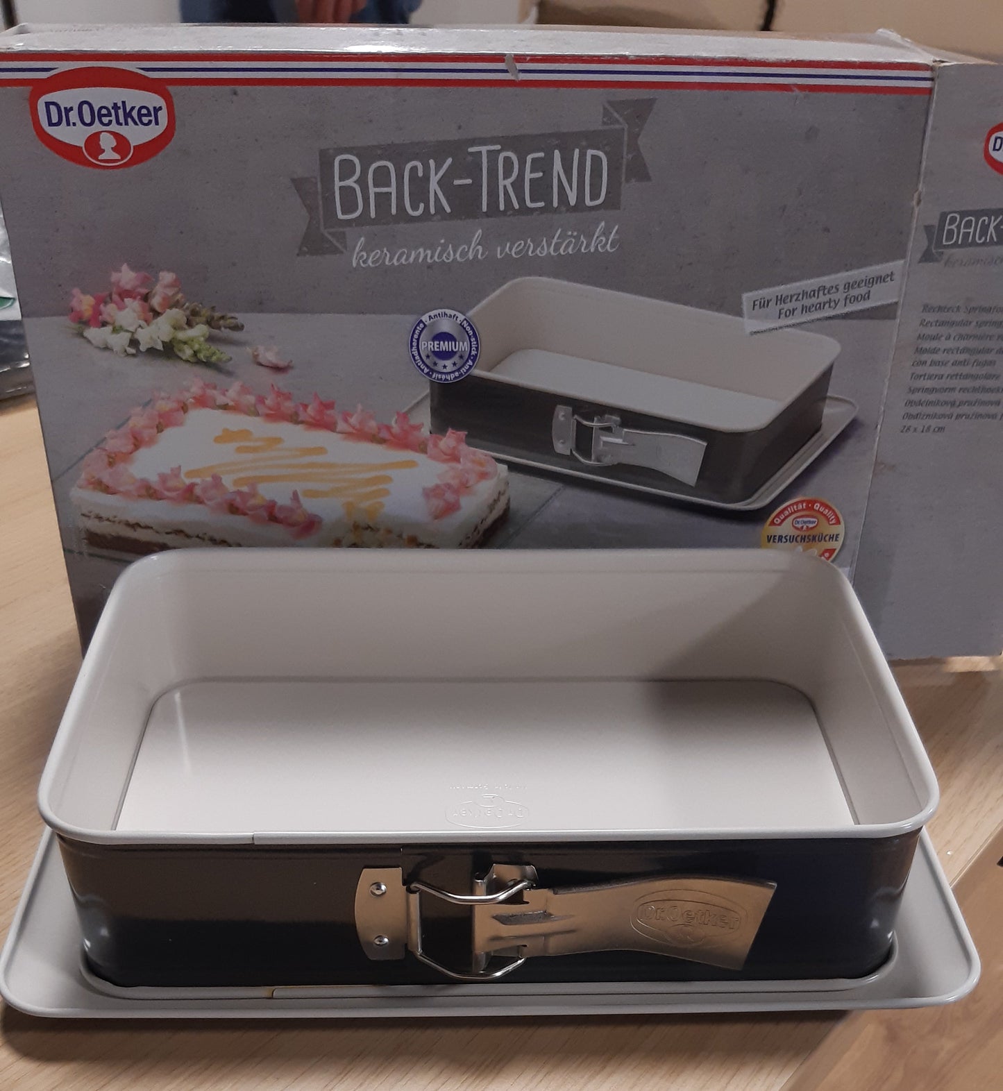 222287 - Dr. Oetker 4860 Tavë për tortë, Tavë drejtkëndëshe me sustë, çelik inox, qeramikë, krem, gri antracit, 28 x 18 x 7 cm