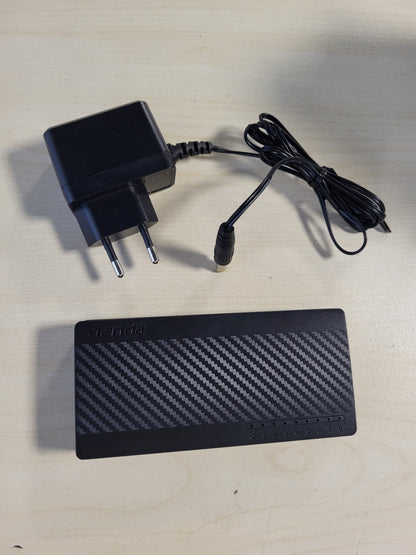 266184 - Tenda SG108, Ndërprerës Ethernet Gigabit, 8 Porta, Qendër Rrjeti e Pamenaxhuar, Plug & Play, Porta të Mbrojtura, Kuti Plastike, Montim në Tavolinë/Mur, Pa Ventilator