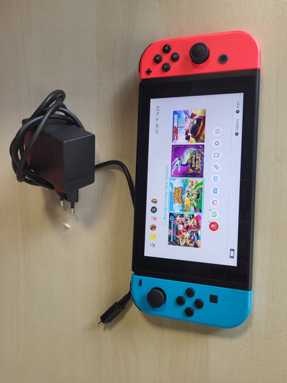 267554 - NINTENDO KONSOLA SWITCH, Ngjyrë Blu Neoni dhe të Kuqe Neoni Joy-Cons