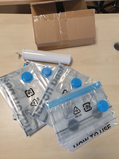 257667 - Amazon Basics Qese kompresimi me vakum, madhësia X-Jumbo, pako me 4, për rroba, transparente
