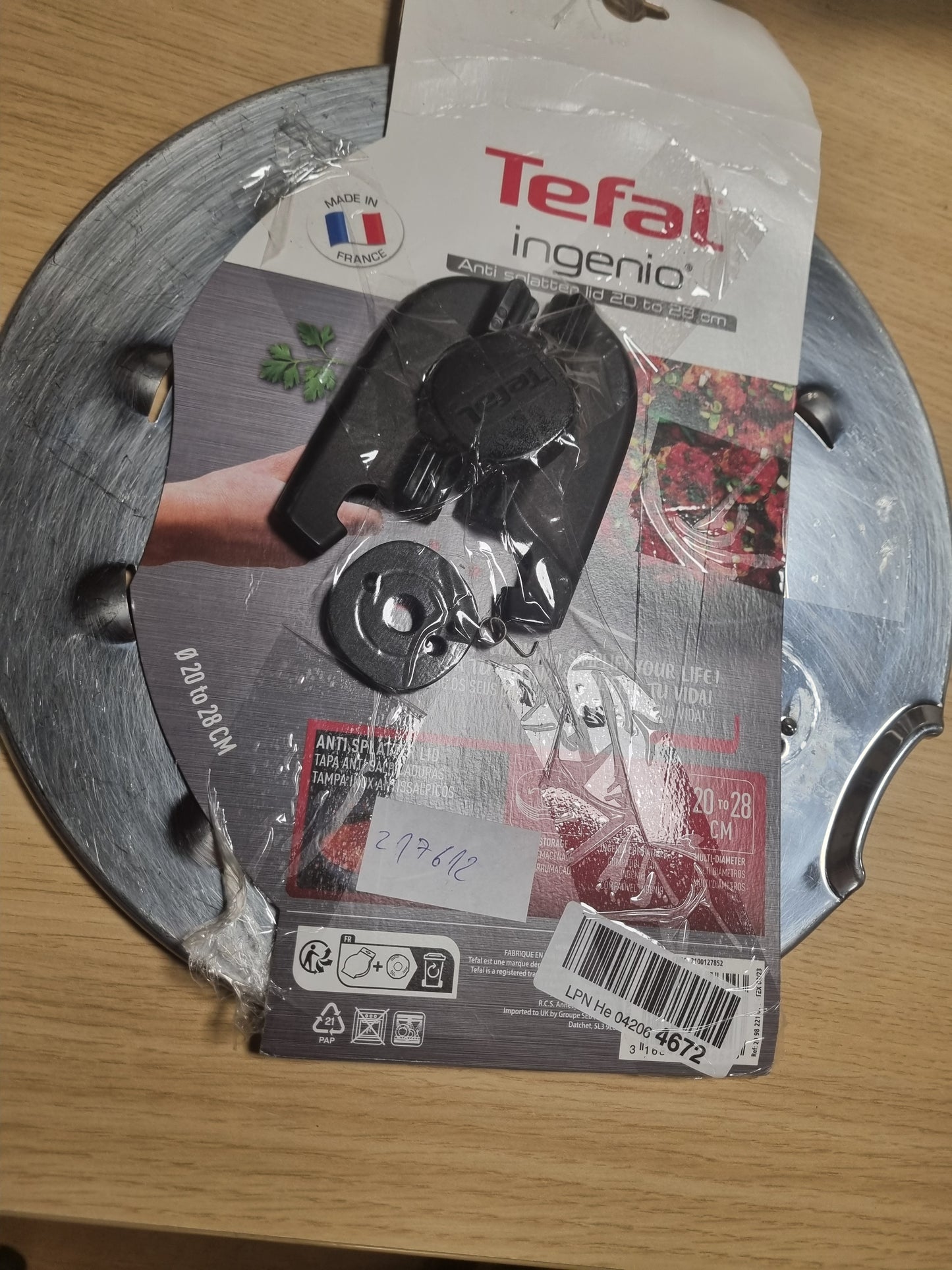 217612 - TEFA INGENIO Kapak mbrojtës nga spërkatjet, kapak i shumëfishtë prej çeliku inox 20-28 cm, i pajtueshëm me setet e tenxhereve dhe tiganëve Ingenio, kursim hapësire, i grumbullueshëm, i sigurt për lavastovilje, kullues i lehtë, L98298