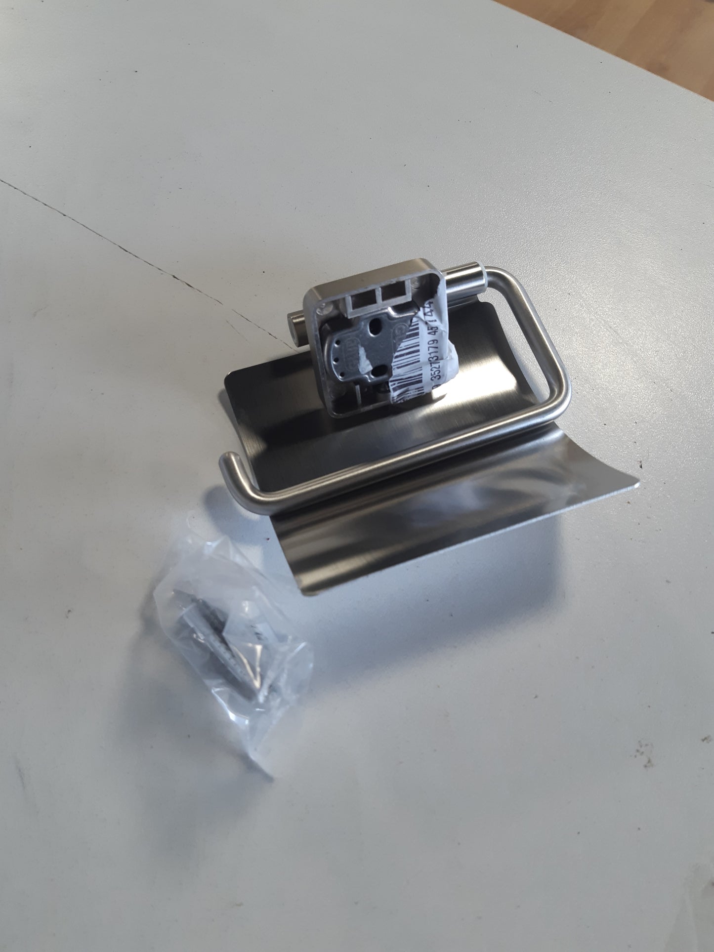 221860 - TIGER ONU Mbajtëse letre higjienike me kapak, çelik inox i lëmuar