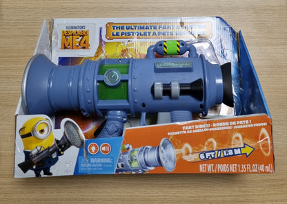 141581 - Lodër Minions Despicable Me 4 Ultimate Fart Blaster - Qëllon unaza të vërteta mjegulle | 15 efekte zanore qesharake | Ndiz dritën dhe aroma bananeje | Përfshin 2 formula aromash | Dhuratë e shkëlqyer për shaka për fëmijë 4+ vjeç