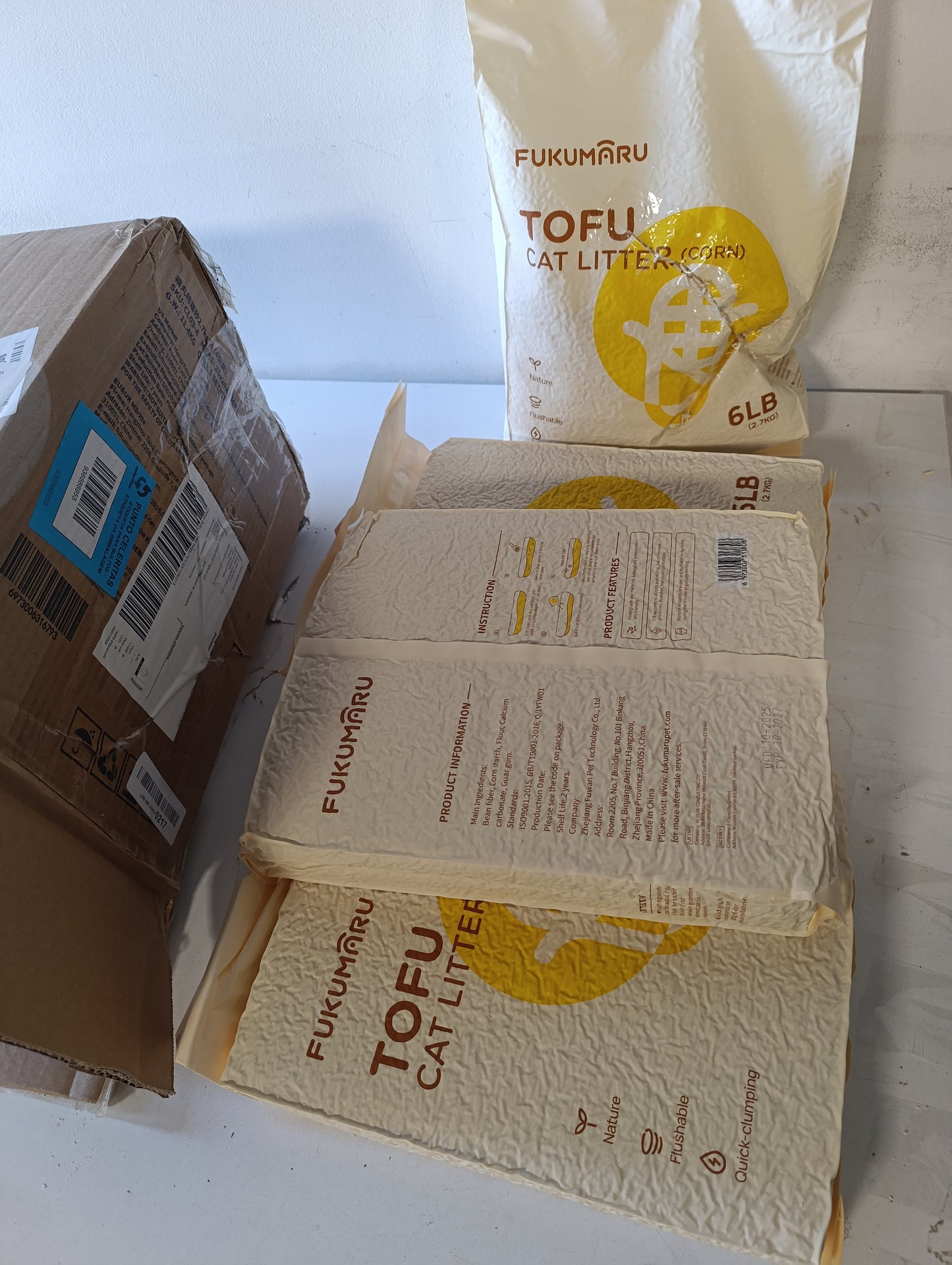 214317 - FUKUMARU Plehra për mace 10.8 kg, përzierje kokrrizash misri, pa pluhur