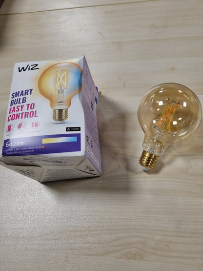 228369 - WIZ Llambë LED inteligjente Wi-Fi 6.7W (ekuivalente me 50W), me bazë G125 E27, filament ngjyrë qelibar, dritë e bardhë me errësim, me teknologjinë SpaceSense dhe e pajtueshme me Alexa dhe Google Home
