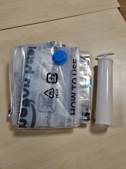 224438 - Amazon Basics Qese kompresimi me vakum, Qese ruajtjeje, me pompë dore, me zinxhir, madhësia X-Jumbo, pako me 4, për rroba, transparente