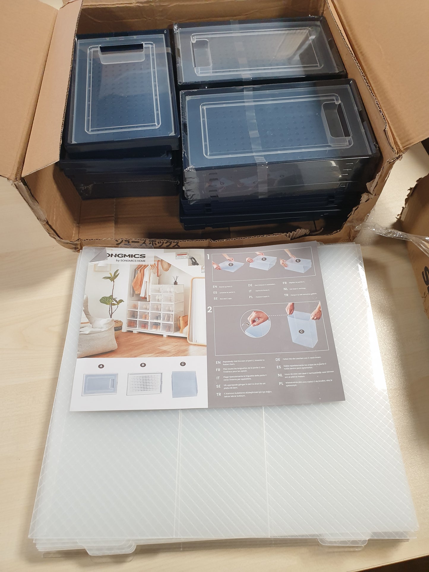 199379 - SONGMICS Kuti për Ruajtjen e Këpucëve, Set Prej 18 Copë, e Palosshme, Përshtatet për Madhësi Këpucësh deri në 44, Ngjyra Transparente dhe Blu Karboni LSP18SB30