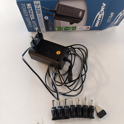 269286 - ANSMANN Furnizim universal me energji 3-12V maks. 300mA maks. 3.6W, Furnizim me energji me ndërrim DC, karikues me 7 priza adaptuese për pajisje elektronike shtëpiake