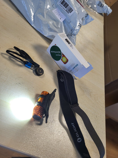 187128 - OLIGHT Llambë Koke Perun 2 Mini LED, Fener Rikarikueshëm, Shkëlqim 1100 Lumen, 5 Nivele Shkëlqimi, I Rregullueshëm 180°, Përdorim për Vrapim, Jogging, Kamping, Sinjalizim Emergjence, Ngjyra Portokalli