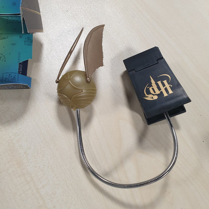 223790 - GOLDEN SNITCH Llambë Leximi me Lumi-Clip, Mall i licencuar i Harry Potter, funksionon me bateri